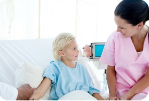 Nurse attending to a girl.